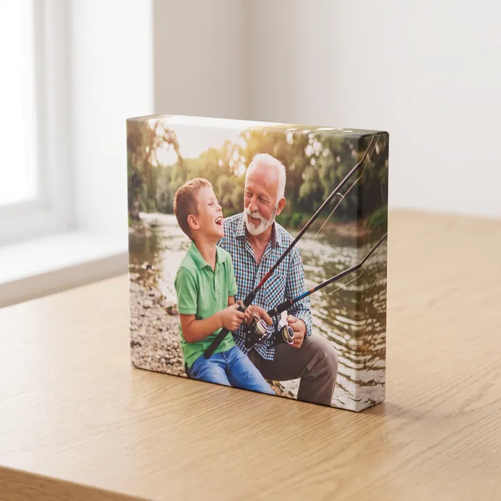 A desktop canvas of a grandad and grandson fishing, its deep side and neat corners visible